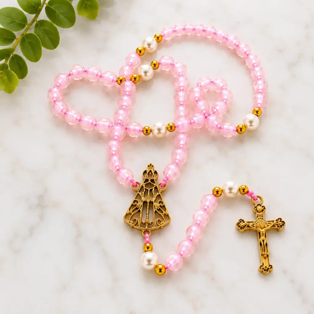 Terço Nossa Senhora Aparecida em dourado latonado (rosa e dourado)